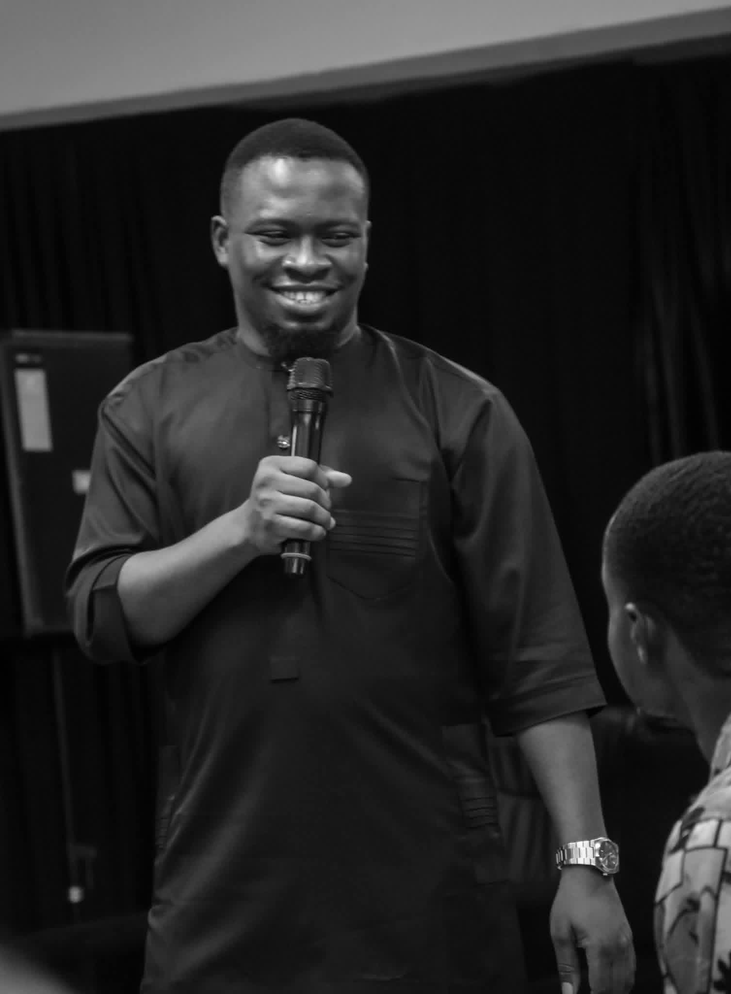 Pastor Samuel teaching believers